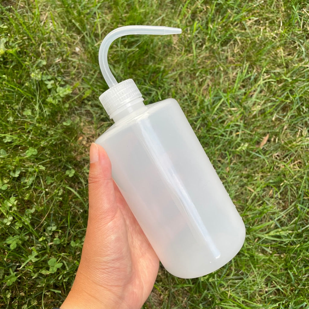 Transparent Squeezable Watering Bottle