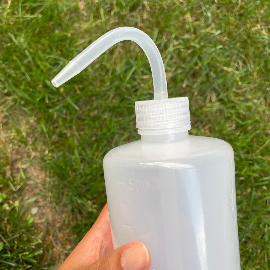 Transparent Squeezable Watering Bottle